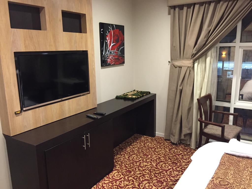 Ashbonh Hotel Suites Rijád Szoba fotó